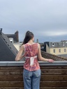 Débardeur à motif orange et mauve 