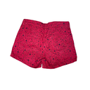 Short rouge avec des fleurs noir  