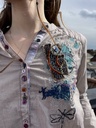 Chemise à motif et a rayure noir et blanc 